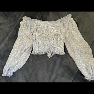 Light blue shirt with white daisy print. SO CUTE!